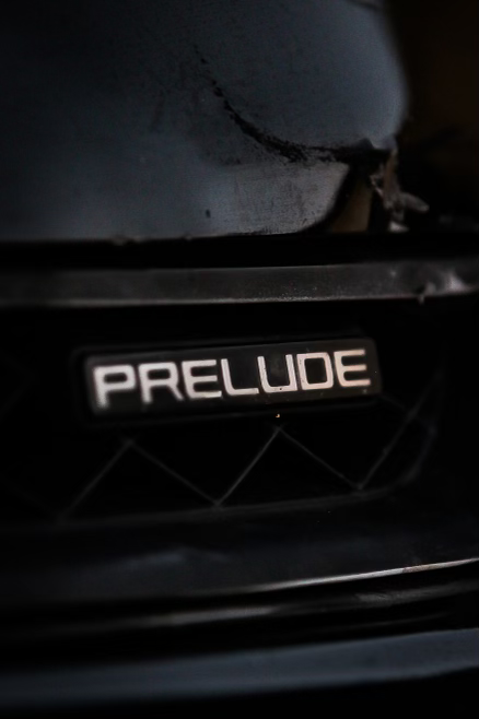 Prelude badge